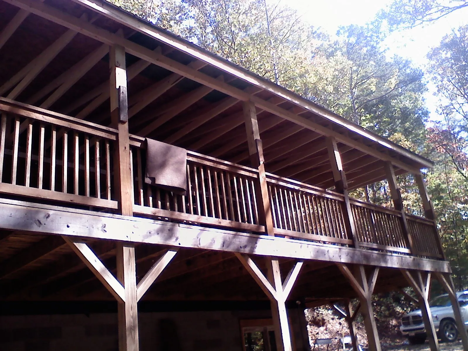 Timber framing under a new elevated porch and deck — Roof Leak Repair in Golf by Roofing Brothers